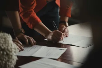 Signing a preliminary contract (compromesso) for a property purchase in Italy in 2025.