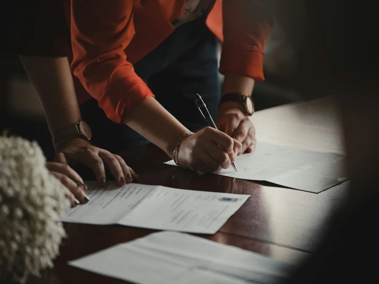 Signing a preliminary contract (compromesso) for a property purchase in Italy in 2025.